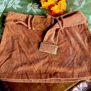 Two corduroy miniskirts large junior. One black and one brown.